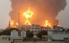 Beeld van de vuurzee na een Israëlische aanval op de Jemenitische havenstad Hodeidah. beeld AFP, Ansarullah Media Center