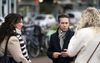 SGP-leider Chris Stoffer tijdens de verkiezingscampagne in gesprek met wakers van Kies Leven bij een abortuskliniek in Rotterdam. beeld ANP, Jeroen Jumelet
