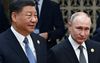 Russisch president Vladimir Poetin (r) en Chinese president Xi Jinping (l) ontmoeten elkaar donderdag. Beeld AFP, Grigory Sysoyev 