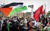 Pro-Palestinamars op de Dam in Amsterdam. beeld ANP, Robin van Lonkhuijsen
