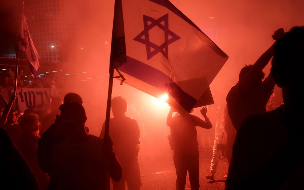 Demonstranten in Tel Aviv eisen een bestand tussen Israël en Hamas dat leidt tot de vrijlating van gijzelaars en een einde aan de oorlog. beeld AFP, Jack Guez