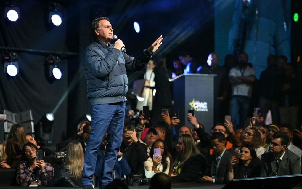 Voormalig Braziliaans president Jair Bolsonaro spreekt begin juli tijdens een conferentie in zijn land. beeld AFP, Evaristo Sa