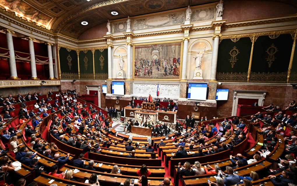 De voorzitter van het Franse parlement, Yaël Braun-Pivet, spreekt de volksvertegenwoordiging donderdag toe na haar herverkiezing. beeld AFP, Bertrand Guay