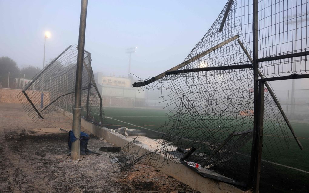 Het voetbalveldje in Majdal Shams na de raketaanval. beeld AFP,  Menahem Kahana