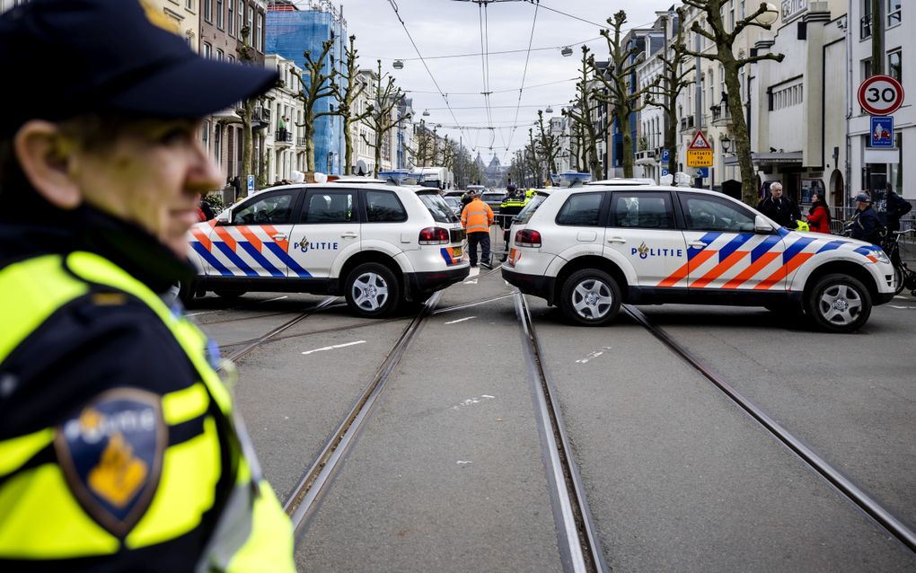 Politiebeveiliging in Amsterdam. beeld ANP, Michel van Bergen 