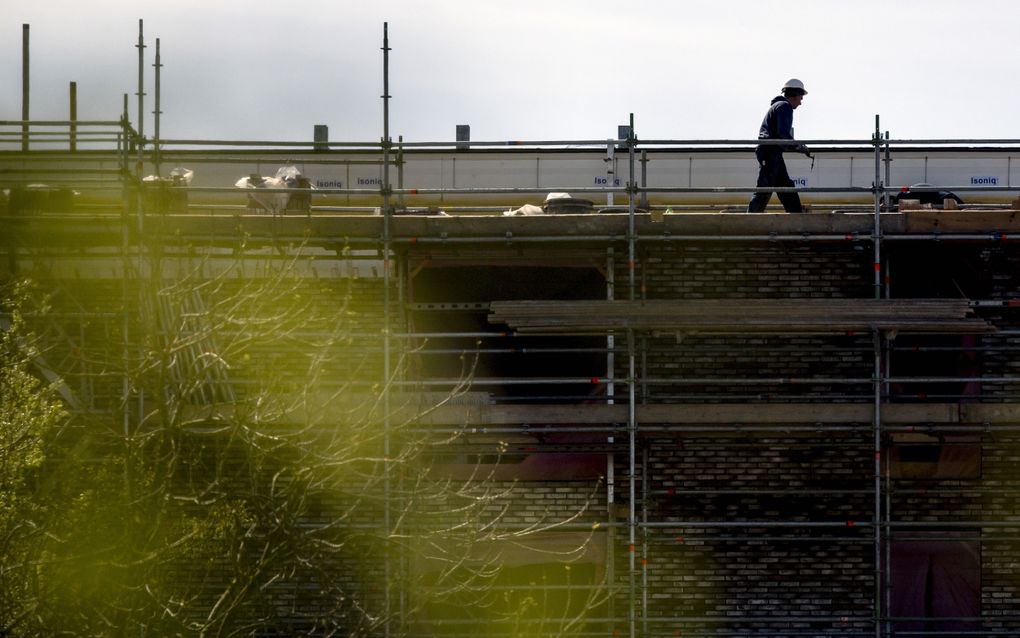 Werkzaamheden bij een nieuwbouwproject in aanbouw. beeld ANP, Koen van Weel