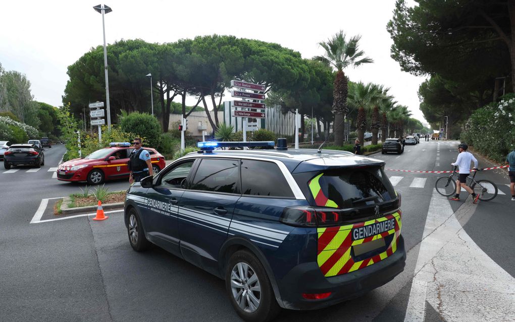 Politie zet de straat van de synagoge af. beeld AFP, Pascal GUYOT