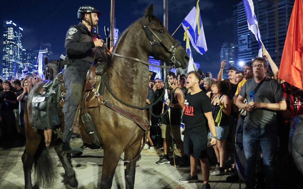 Demonstratie in Tel Aviv voor de vrijlating van Israëlische gegijzelden. beeld AFP, Jack Guez