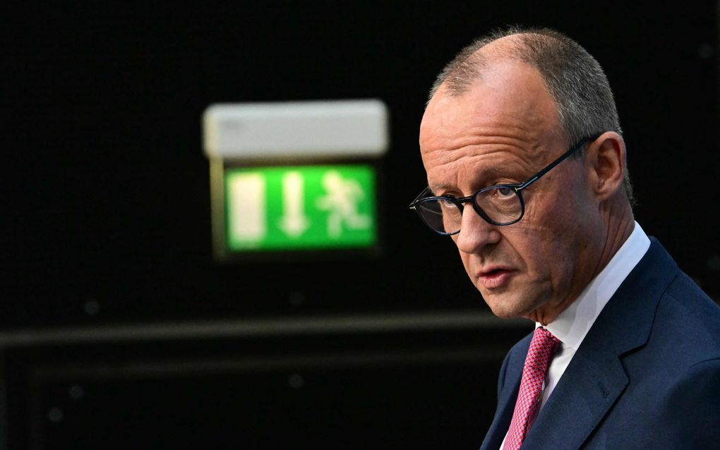 CDU-voorzitter Friedrich Merz tijdens een persconferentie in Berlijn, Duitsland. beeld AFP, Tobias Schwartz