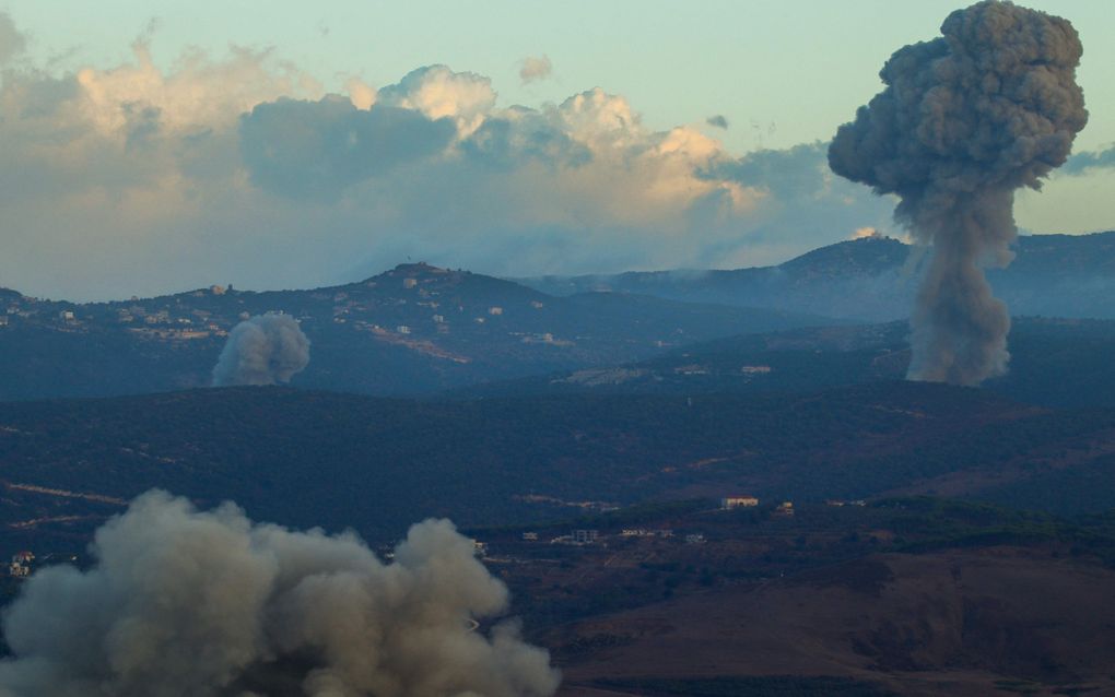 Luchtaanval maandagmorgen op een doel in Aramti, aan de grens met Libanon. beeld AFP, Ammar Ammar