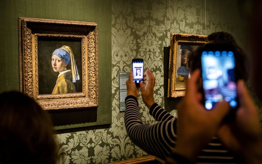 Belangstelling voor ”Meisje met de parel” van Vermeer in het Mauritshuis in Den Haag. beeld ANP, Bart Maat