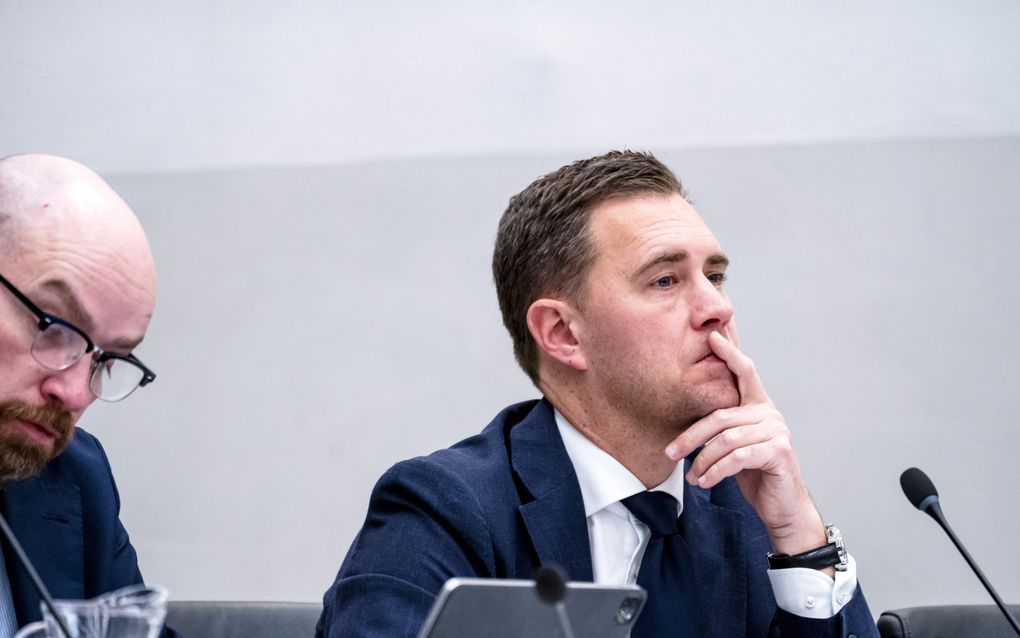 Eelco Heinen (r), Minister van Financiën, tijdens een wetgevingsoverleg in de Tweede Kamer. beeld ANP, Lina Selg