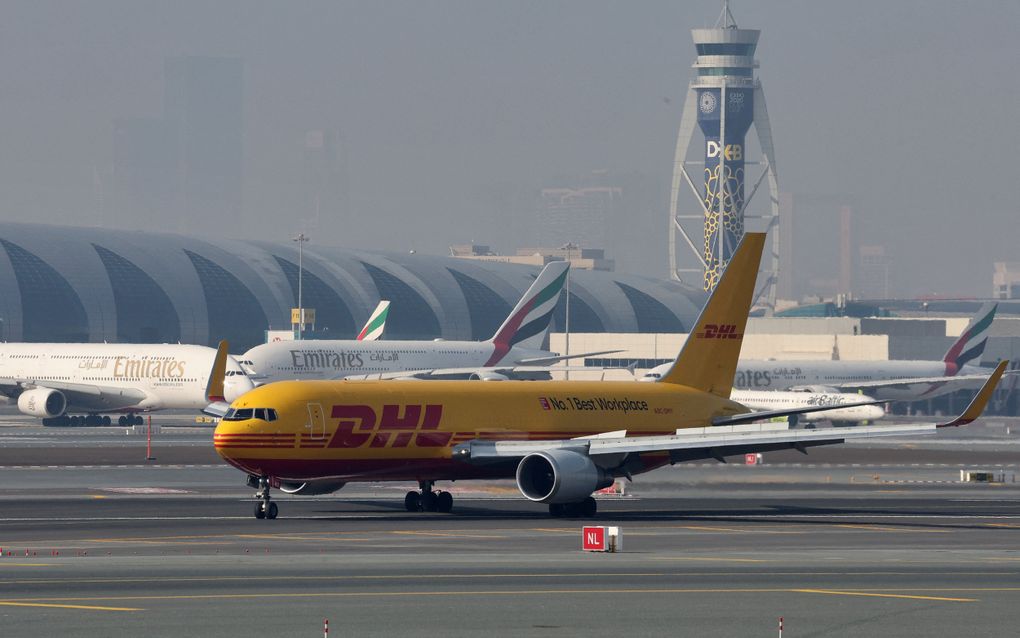 Een DHL-vrachtvliegtuig. beeld AFP, Giuseppe Cacace