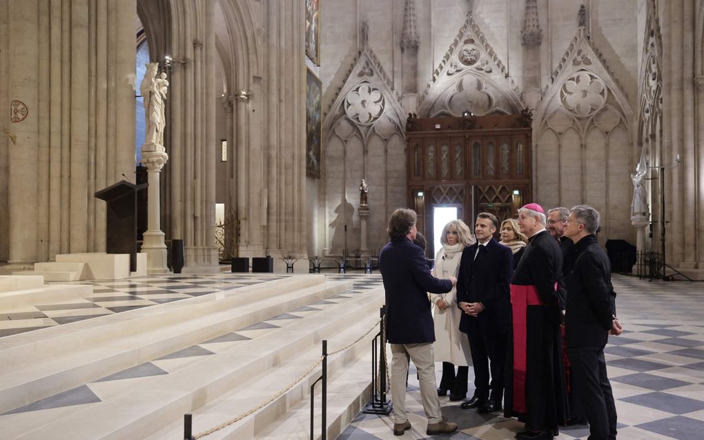 De Franse president Emmanuel Macron bezoekt vrijdag de gerestaureerde Notre-Dame. beeld AFP, Christophe Petit Tesson 