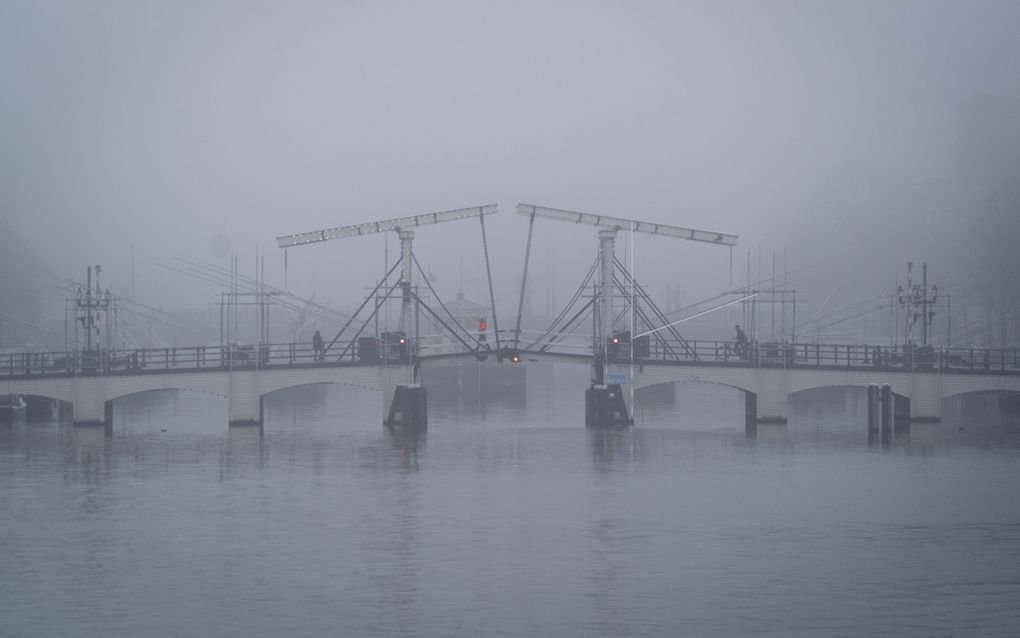 Op grijze en windstille dagen is er nauwelijks tot geen stroom uit zon en wind. beeld Getty Images