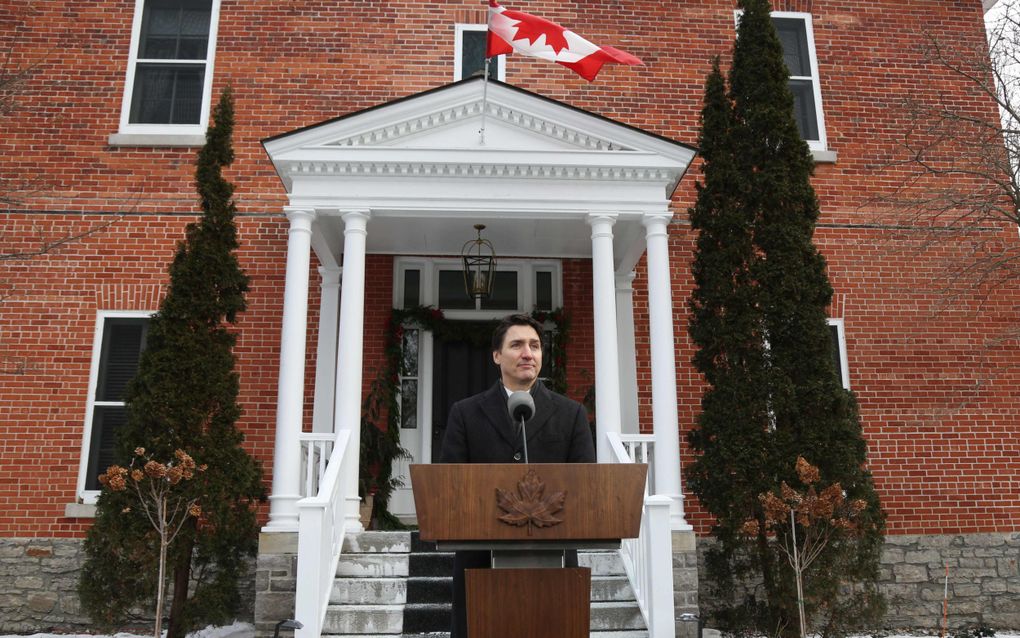 De Canadese premier Justin Trudeau maakt zijn aftreden bekend. beeld AFP, Dave Chan