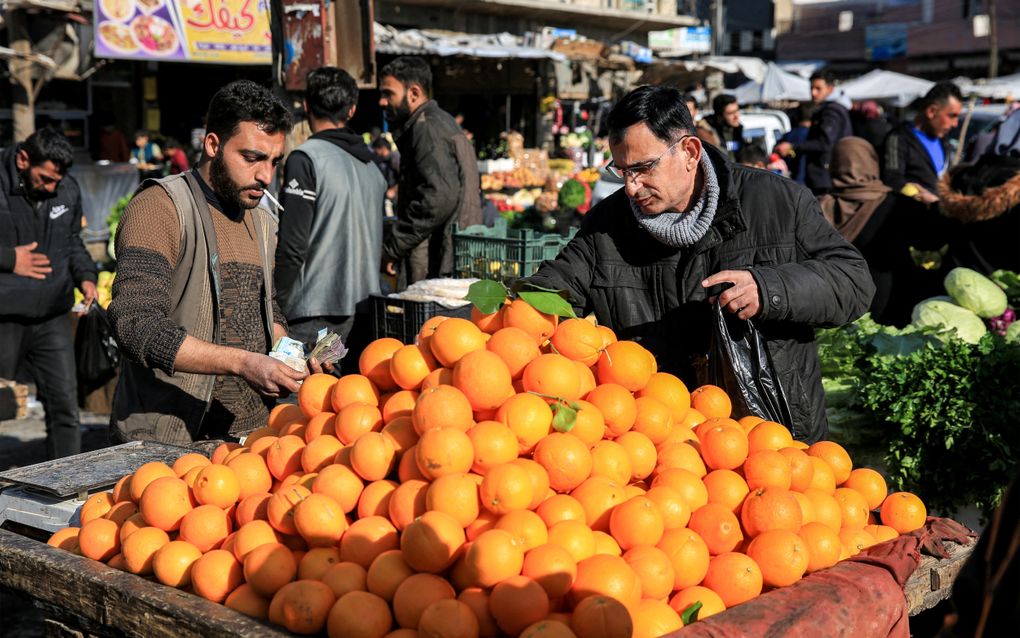 Sinaasappels op een markt in Syrië. beeld AFP, Aref Tammawi