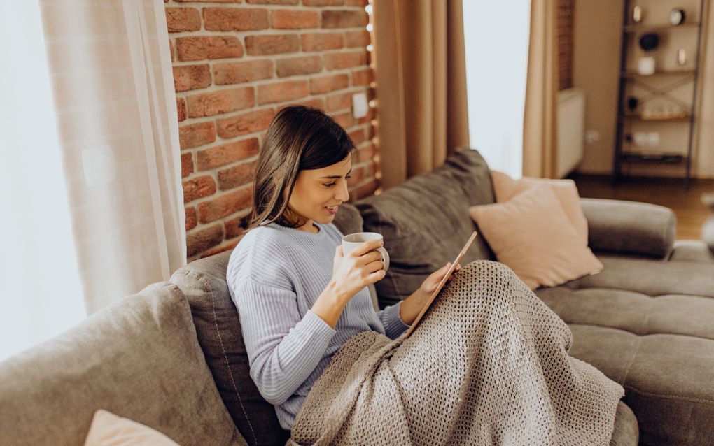 „Zet de thermostaat een graadje lager en doe een dikke trui aan.” beeld iStock