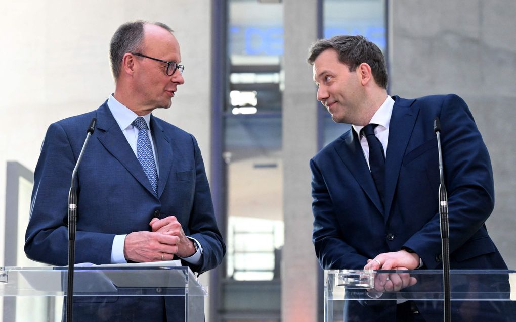 CDU-leider Friedrich Merz en SPD-leider Lars Klingbeil. beeld AFP, Ralf Hirschberger 