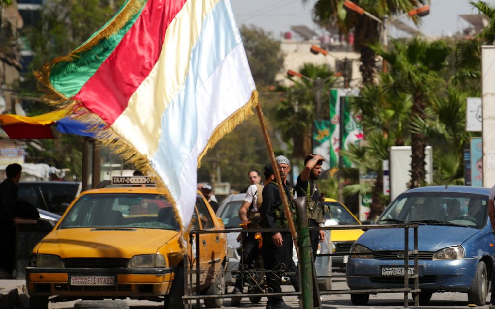 Gewapende druzen bewaken Jaramana, een voorstad van Damascus. beeld AFP, Rami al Sayed