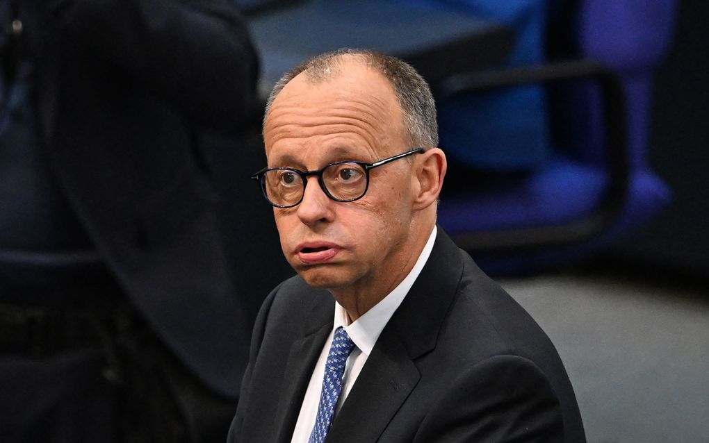 Merz net voor de tweede stemming over zijn benoeming. beeld AFP, RALF HIRSCHBERGER / AFP)