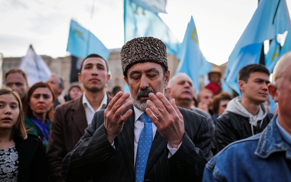 Krim-Tataren herdenken ieder jaar dat ze door Sovjetdictator Jozef Stalin in 1944 van de Krim werden gedeporteerd. Op de foto de herdenking van 2015 in de Oekraïense hoofdstad Kyiv. beeld EPA, Roman Pilipey