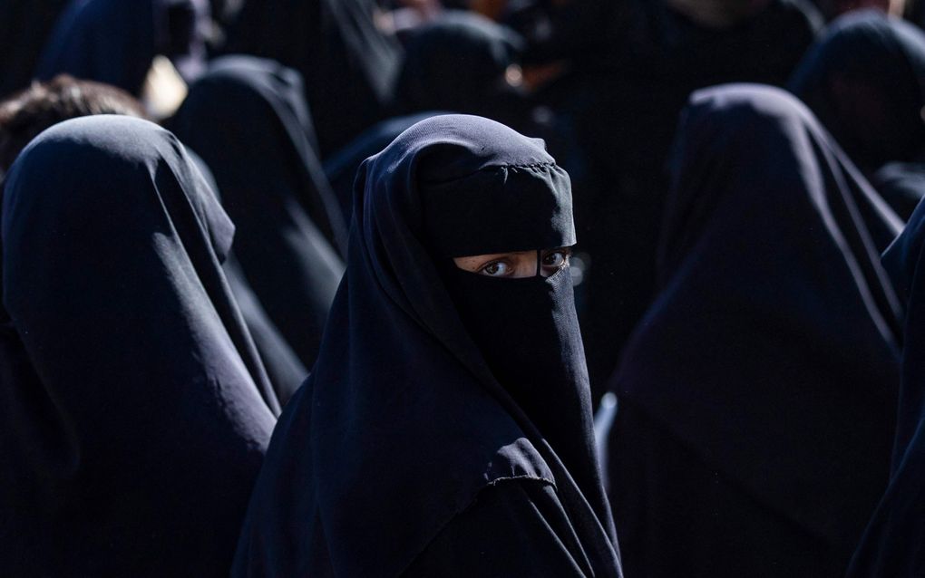 Een vrouw in een boerka. 