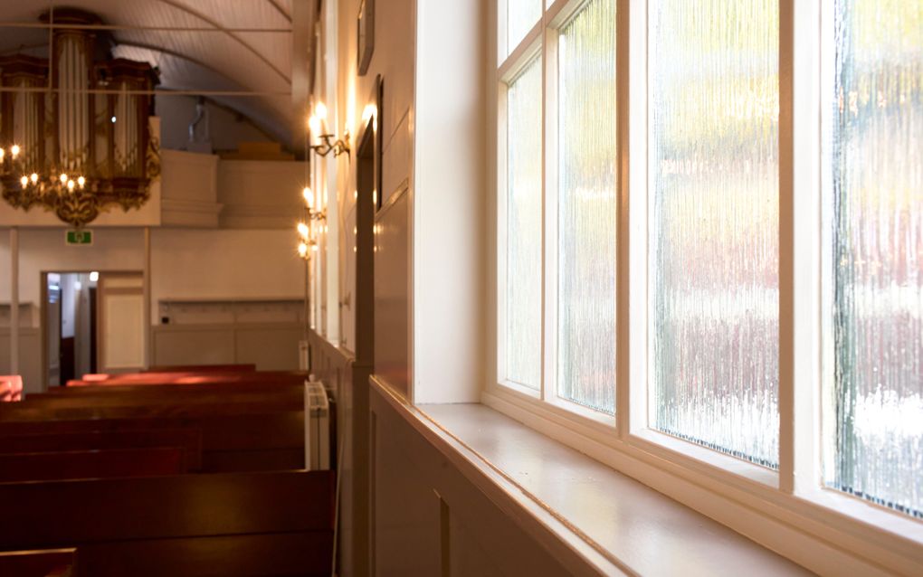 Detailopname van de nieuwe kozijnen en glas.