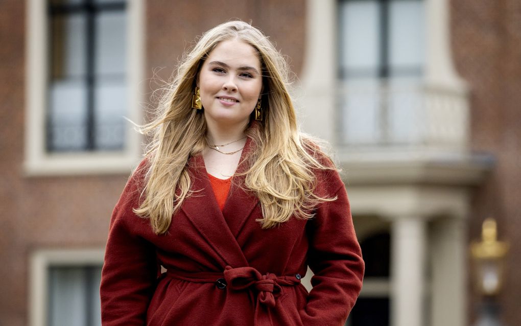 Prinses Amalia tijdens de traditionele fotosessie van de koninklijke familie op Paleis Huis ten Bosch. beeld ANP, Koen van Weel