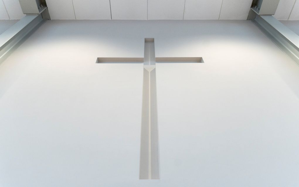 Een kruis aan de muur.