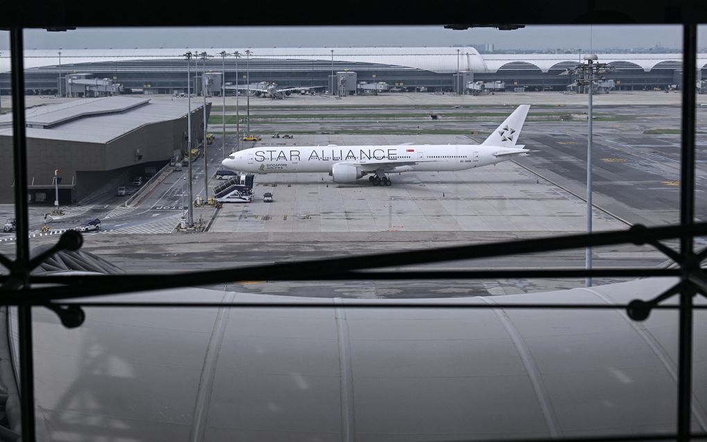 Het Singapore Airlines Boeing 777-300ER vliegtuig was onderweg naar Singapore, maar maakte een noodlanding vanwege ernstige turbulentie. beeld AFP, Lilian Suwanrumpha