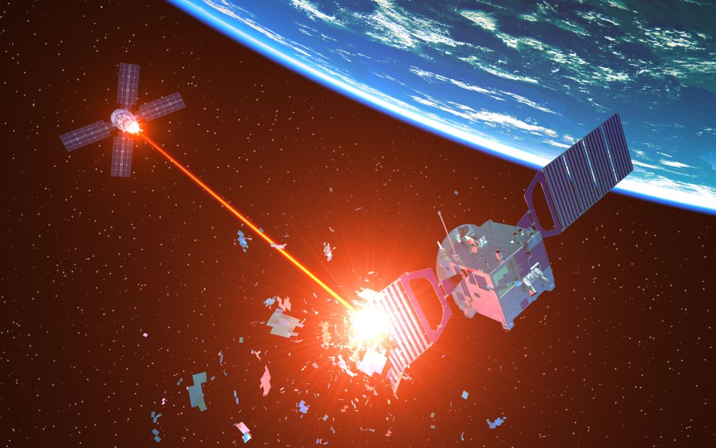 Toekomstige oorlogen worden ook uitgevochten in de ruimte. Artist’s impression van een satelliet die een andere satelliet vernietigt met een laserstraal. beeld iStock