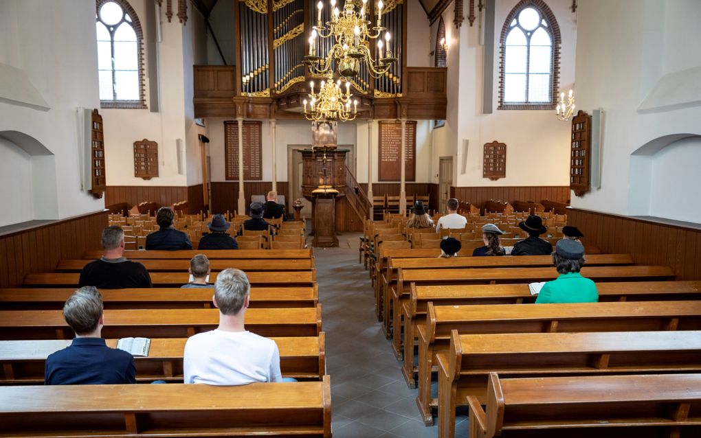 Ruim driekwart van de Nederlandse kerkgangers is trots op hun kerk. André Dorst