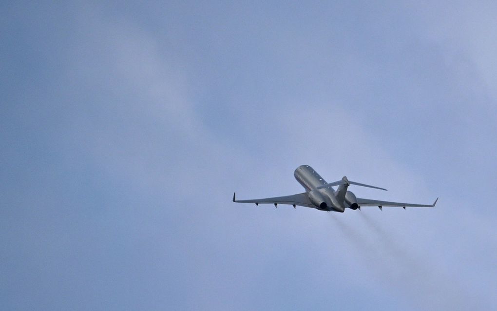 Een toestel met aan boord naar verluidt Julian Assange vertrekt van Saipan International Airport op het Amerikaanse eiland Saipan, in de Grote Oceaan. beeld AFP, Yuichi Yamazaki