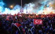 Aanhangers van de oppositie in Turkije vieren feest. beeld AFP, YASIN AKGUL