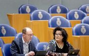 BBB-Kamerleden Cor Pierik (l.) en Caroline van der Plas tijdens een debat in de Tweede Kamer. beeld ANP, Sem van der Wal
