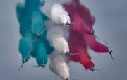 De Italiaanse luchtmacht laat zijn kunsten zien tijdens een luchtshow. beeld EPA, Giuseppe Lami  