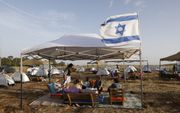 „Het gesprek over Israël en het Joodse volk is te complex geworden. De juiste kennis hierover is vrijwel afwezig.” Foto: Israëliërs die zijn geëvacueerd uit gebieden nabij de Libanese grens. beeld AFP, Jalaa Marey 