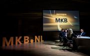 Demissionair premier Mark Rutte (rechts) was te gast tijdens het jaarcongres van MKB-Nederland op 22 november 2022. Links aan tafel voorzitter Jacco Vonhof van de belangenorganisatie. beeld ANP, Bart Maat