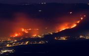 Bosbranden teisteren het noorden van Israël nadat Hezbollah een salvo raketten heeft afgevuurd. beeld AFP, Jalaa Marey