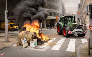 Boeren voeren op 26 maart actie in de straten van Brussel tijdens een ontmoeting van de Europese ministers van Landbouw. beeld AFP, James Arthur Gekiere