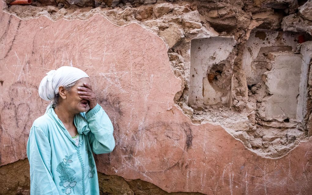 Een bewoner bij de verwoeste huizen. beeld AFP, Fadel Senna