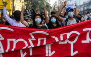 Demonstranten in Yangon. beeld AFP
