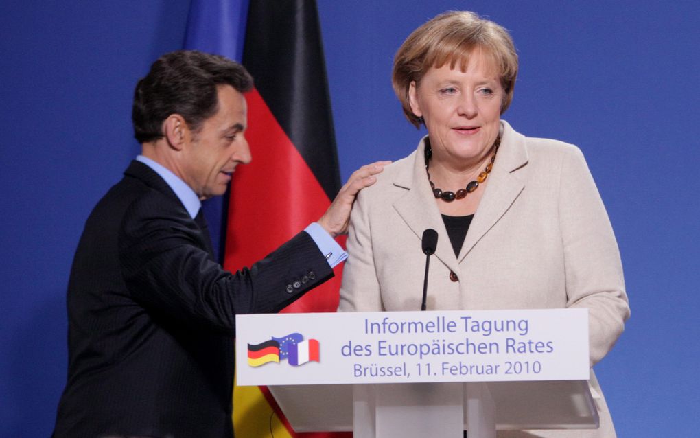 Sarkozy en Merkel tijdens een persconferentie. Foto EPA