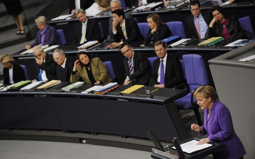 De euro is volgens de Duitse bondskanselier Merkel in gevaar. Foto EPA