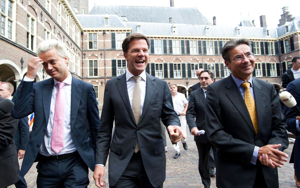 Wilders, Rutte en Verhagen kunnen er wel om lachen. Foto ANP