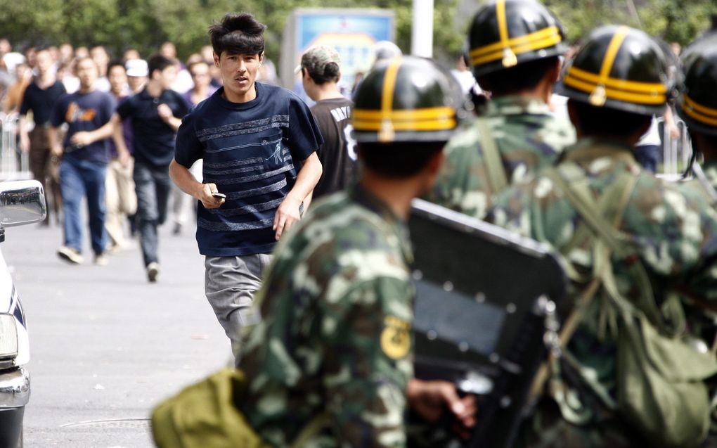 Onrust in Urumqi, een jaar geleden. Foto EPA