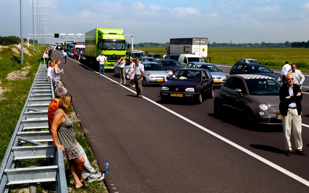 Demissionair minister Eurlings (Verkeer en Waterstaat) opent dinsdagmiddag extra rijstroken op de A2. Foto ANP