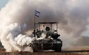 Israëlische tank aan de grens tussen Israël en de Gazastrook. beeld AFP, Jack Guez