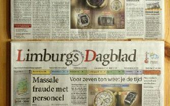 SITTARD: De voorpaginas van Dagblad De Limburger en Limburgs Dagblad donderdag. De paginas lijken veel op elkaar: dezelfde foto en hetzelfde openingsverhaal. Kartelwaakhond NMa deed een inval in het gebouw in Sittard waarin het facilitair bedrijf van de t